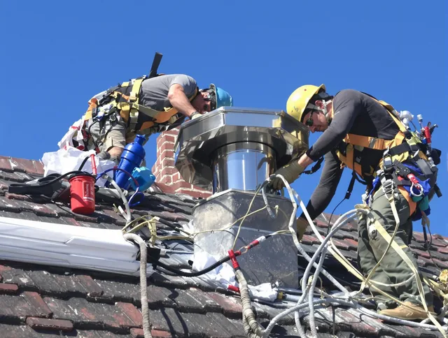 Protective chimney cap installed by Tallmadge Chimney Sweep in Tallmadge, OH