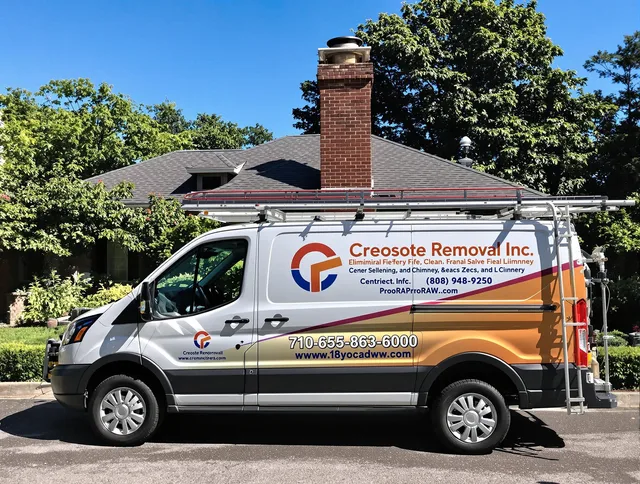 Tallmadge Chimney Sweep technician removing creosote safely in Tallmadge, OH