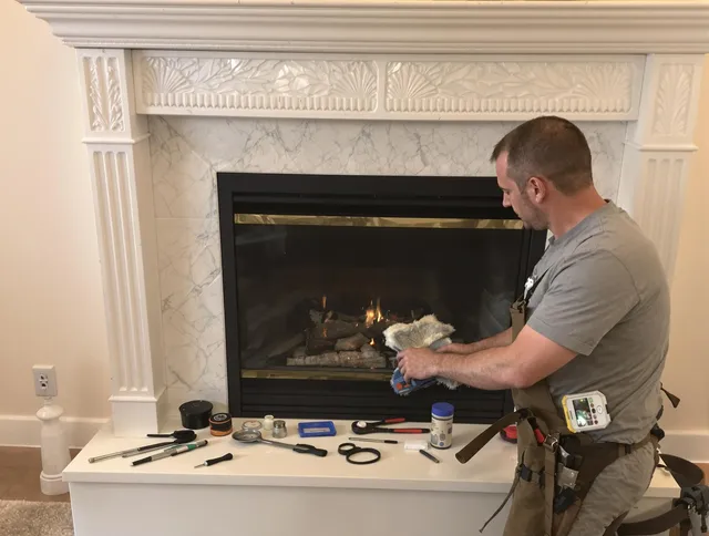 Tallmadge Chimney Sweep performing fireplace maintenance in Tallmadge, OH